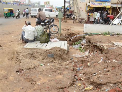 4 inches of rain washed away the service road of Modhera underpass in ...
