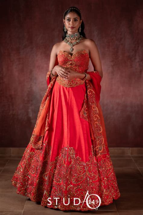 Bold in Raw Silk- Studio 149’s Orange Corset Lehenga for weddings/sang ...