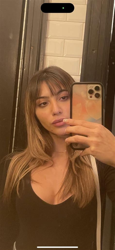 Two questions: what face shape do I have? should I get bangs? Everyone ...