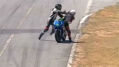 Road Rash goes real. Two bikers thrash each other during race. Seen the ...