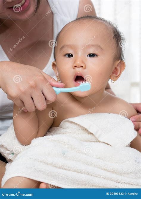 Baby oral care stock image. Image of home, mother, infant - 30503633
