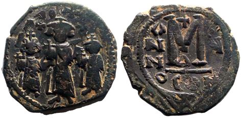 Heraclius AE26 Follis. Heraclius w. wife and son. Constantinople