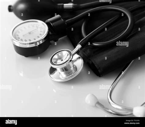 Blood pressure meter and stethoscope, on white background Stock Photo ...