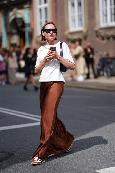 6 ways to wear a maxi skirt with trainers | Vogue India