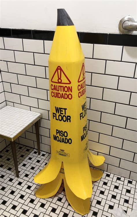 This banana wet floor sign : r/interestingasfuck