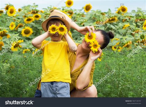 Two Babies Family Sunflowers Royalty-Free Images, Stock Photos & Pictures | Shutterstock