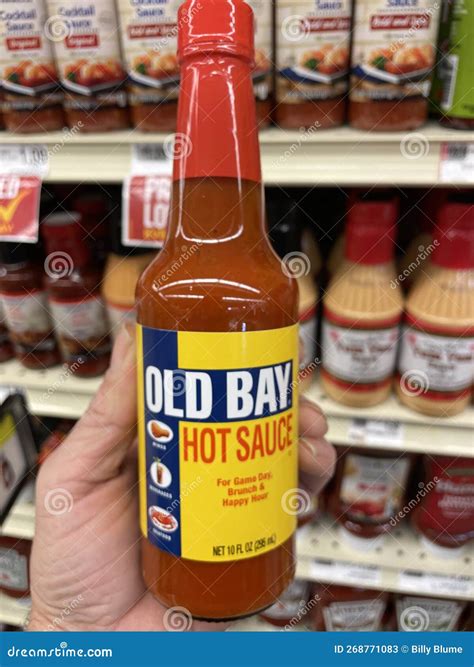 Grocery Store Hand Holding Old Bay Hot Sauce Editorial Stock Photo ...