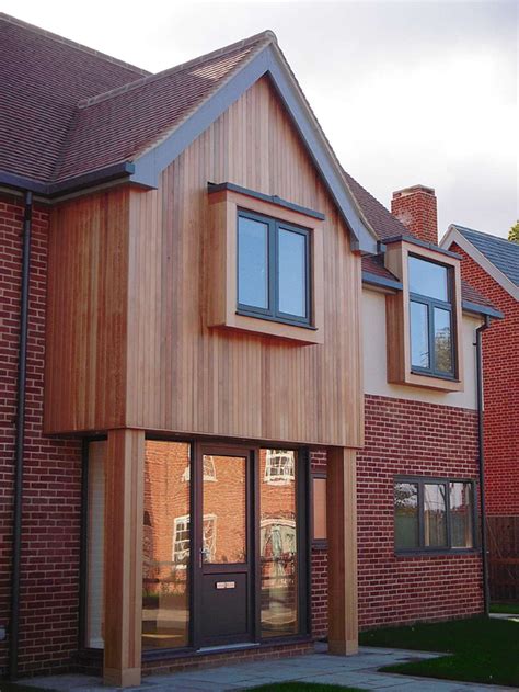 Iroko wood cladding house | Exterior cladding, House cladding, Wood ...