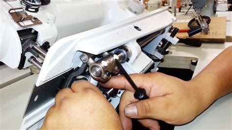 Image result for Sewing Machine Thread Stuck Under Cloth