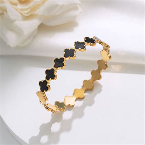 Buy Gold-Plated Anti Tarnish Black Clover Themed Charm Bracelet in Bulk ...