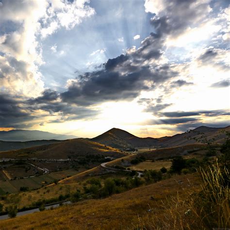 Download wallpaper 2780x2780 slope, valley, road, mountains, clouds ...