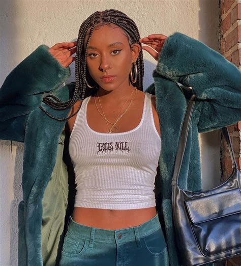 Download A woman confidently walking with a sense of purpose, style and ...