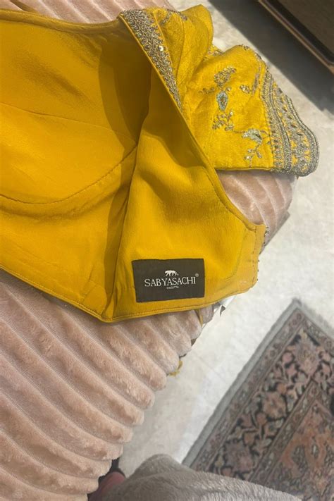 Sabyasachi Yellow floral embroidered lehenga set – Kuro Clothing India