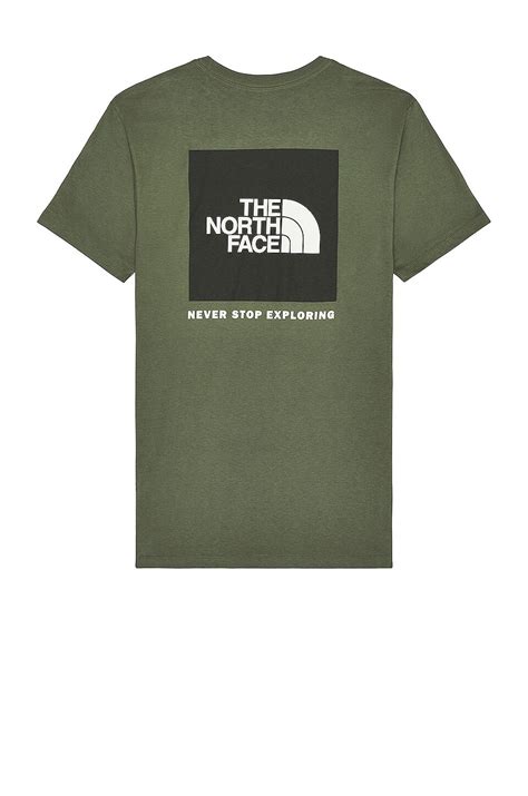 The North Face Short Sleeve Box NSE Tee in Thyme & TNF Black | REVOLVE