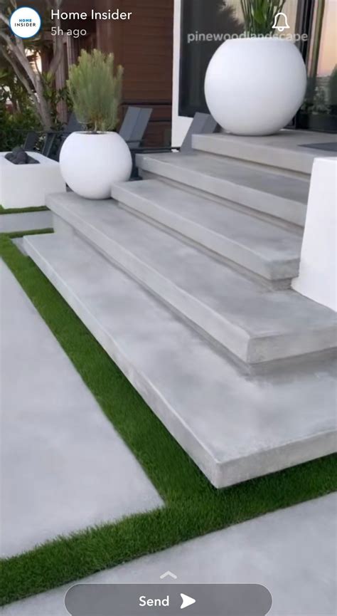 Polished concrete floating stairs create a bold architectural feature ...