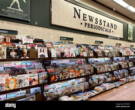 A view of current event magazines on display shelves at the Barnes and ...