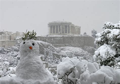 See The Acropolis Covered In Snow After A Rare Storm