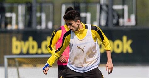 Borussia Dortmund’s Marc Bartra returns to training a month after being ...
