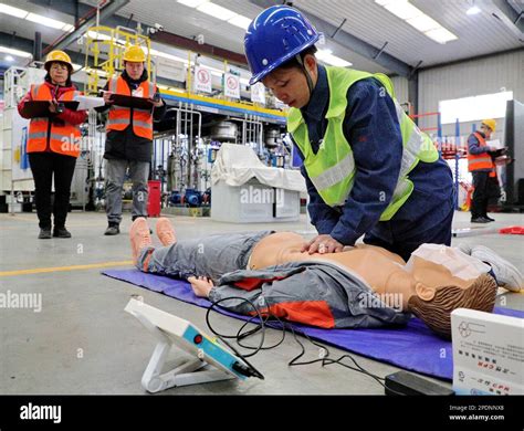 QINHUANGDAO, CHINA - MARCH 15, 2023 - Runners perform cardiopulmonary ...