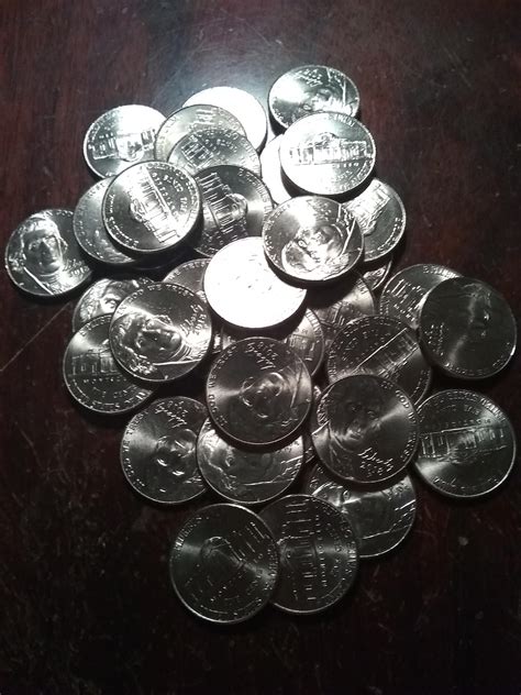 Opened a roll of nickels and was met with only 2018 p's : r/coins