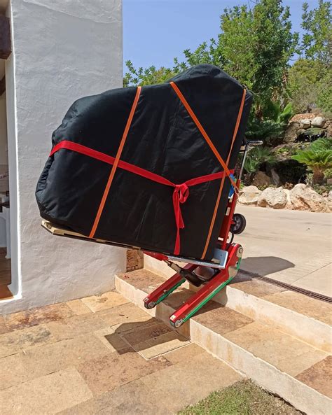 Moving pianos with the Zonzini electric stair climber