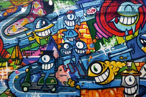 Download Brightly Colored Urban Graffiti Art Wallpaper | Wallpapers.com