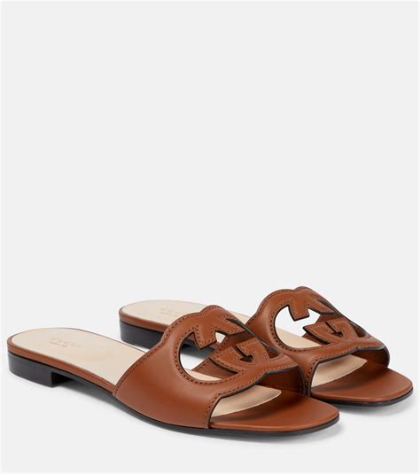 Interlocking G cutout leather sandals in brown - Gucci | Mytheresa