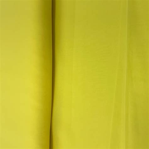 Buy Light Yellow Solid Georgette Fabric Online – TradeUNO Fabrics
