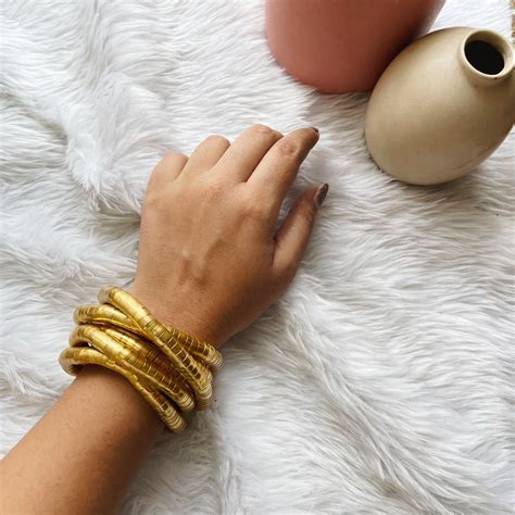 Twisted Coil Hand Cuffs Viral – A Little Extra