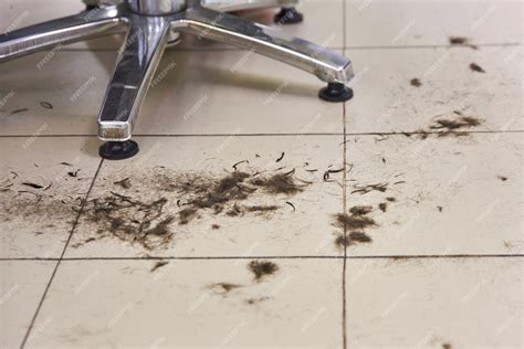 Premium Photo | Hair on the floor at the barbershop