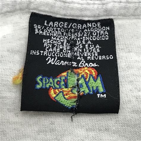 WARNER BROTHERS SPACE JAM 90年代 USA製 NEBRASKA CORN HUSKERS 長袖Tシャツ ロンT ...