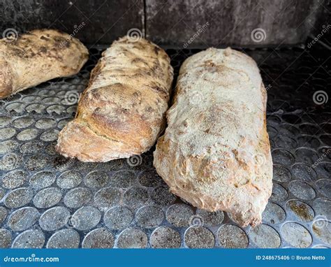 Baking Artisanal Italian Bread in the Coal Oven. Toasted Breads Ready ...