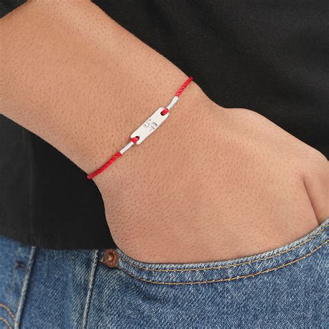 Swastik Charm Rhodium-Plated Sterling Silver Thread Rakhi For Him – Zavya