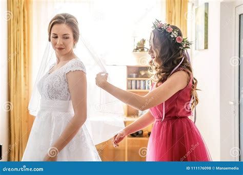 Image result for Bridesmaid Helping Bride