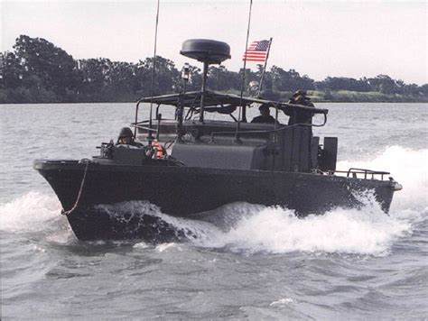 A MK-2 PBR (Patrol Boat, River Class) moving at top speed (on step) on ...
