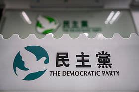 Hong Kong's biggest pro-democracy party votes to disband after more ...