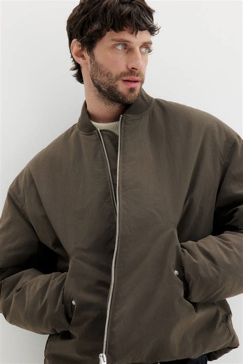 Loose Fit Nylon bomber jacket - Dark khaki green - Men | H&M IN
