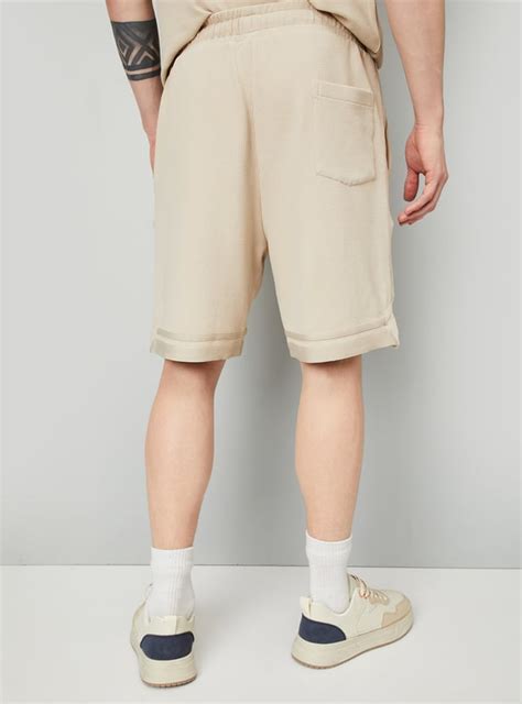 Buy Men Textured Regular Fit Sports Shorts Online at just Rs. 799.0 ...