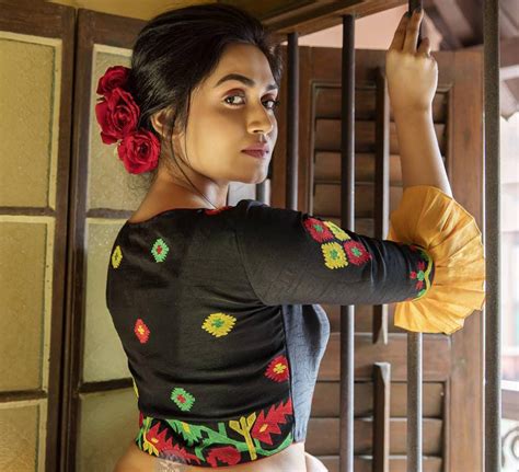 Geo Floral Embroidered Boat Neck Bell Sleeves Piping detailing Blouses ...