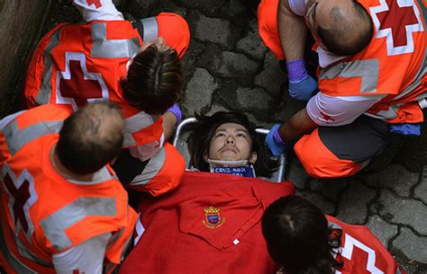 OLE! Smashing PHOTOS of Spanish BULL RUN - Rediff.com News