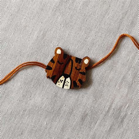 Buy Handpainted Brown Tiger Theme Quirky Wooden Rakhi With Roli Chawal ...