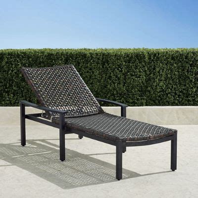 Isola Chaise in Black Aluminum & Black Walnut Wicker with Open Weave Design