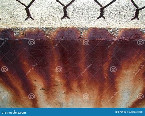 Rust stains on concrete stock image. Image of corrosion - 672945