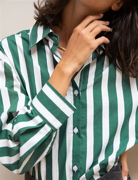 Four Fun Things | Cup of Jo | Wide stripes, Green striped shirt outfit ...
