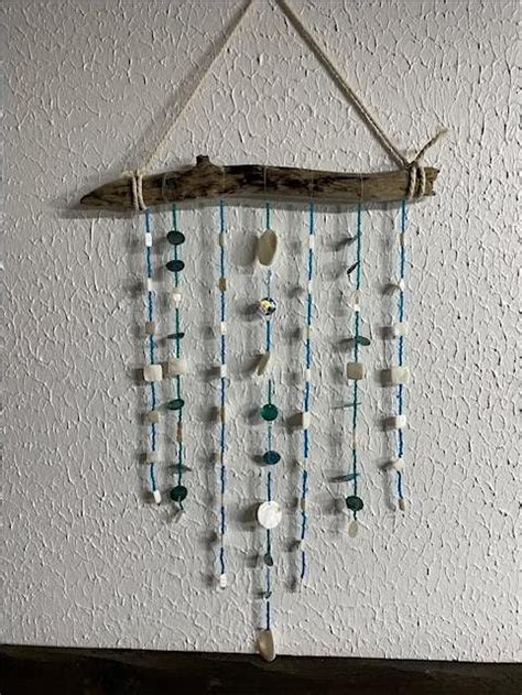 Create a wall hanging/wind chime with driftwood and shells and beads ...