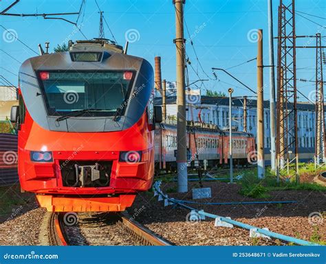 Six-car Commuter Train on the Running Along the Railway Track ...