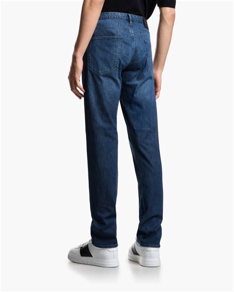 J06 slim-fit, lightly worn-look 8-oz denim jeans | Emporio Armani