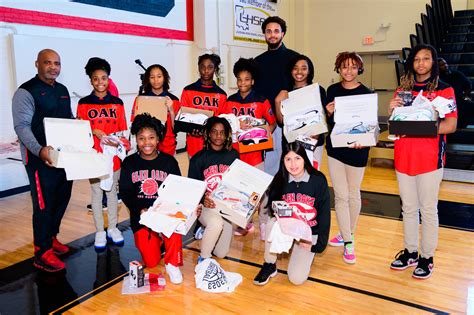 Photos: Jeremiah Robinson-Earl and his father gift basketball shoes to ...