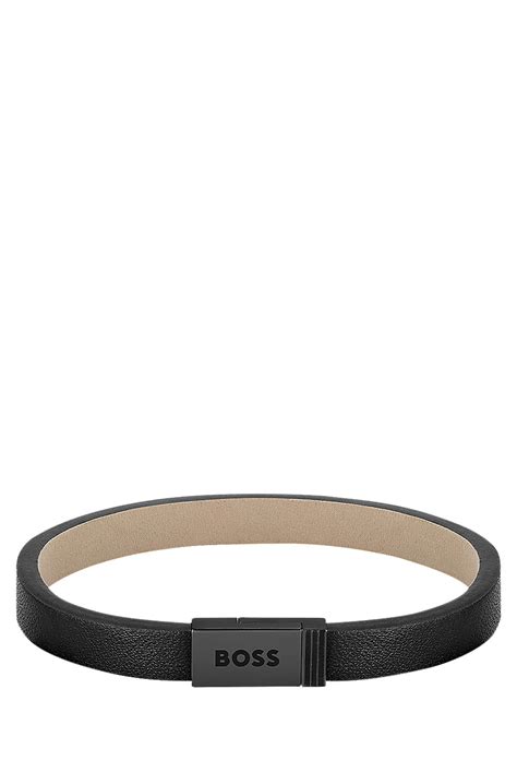 BOSS - Black-leather cuff with branded closure - Black