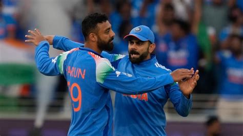 India vs New Zealand - Virat Kohli hits 'SIU', touches Axar's feet in ...